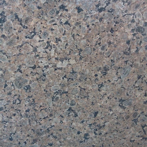 Verdy Dark granite slab face, photographed for the factory catalog — mid-toned grey overall.