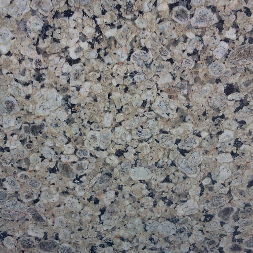Verdy Light granite slab face, photographed for the factory catalog — mid-toned grey overall.