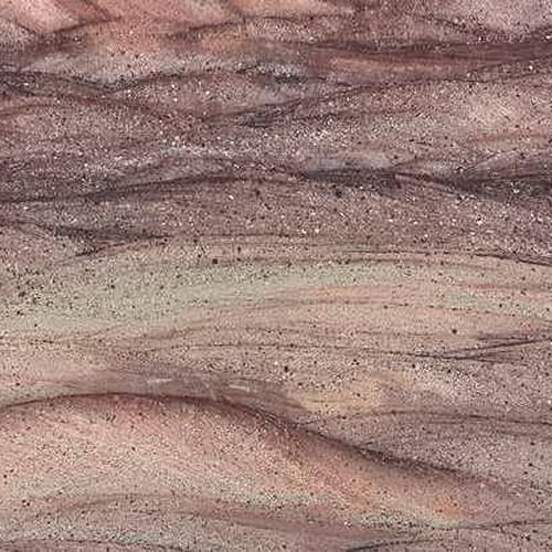 Desert Storm granite slab face, photographed for the factory catalog — mid-toned red overall.