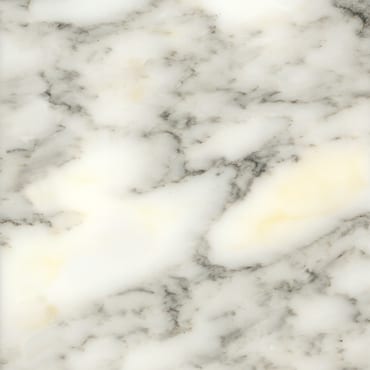 Arabescato marble slab face, photographed for the factory catalog — near-white warm beige overall.
