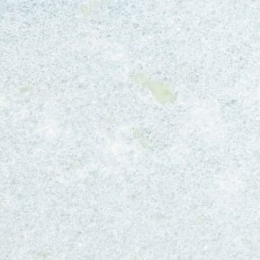 Azul Celeste marble slab face, photographed for the factory catalog — near-white teal overall.