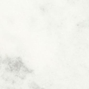 Bianco Brasile marble slab face, photographed for the factory catalog — near-white gold overall.