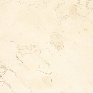 Bianco Perlino marble slab face, photographed for the factory catalog — near-white gold overall.