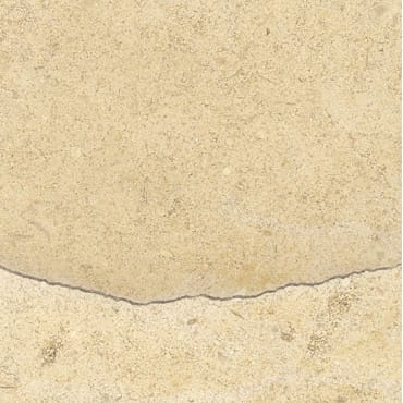 Bursa Beige marble slab face, photographed for the factory catalog — light amber overall.