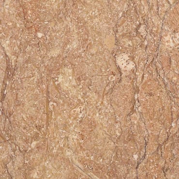 Chiampo Rosato Scuro marble slab face, photographed for the factory catalog — light amber overall.