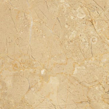 Desert Creme marble slab face, photographed for the factory catalog — light amber overall.