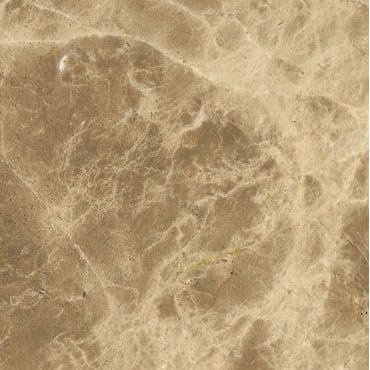 Emperador Lebanon marble slab face, photographed for the factory catalog — mid-toned amber overall.