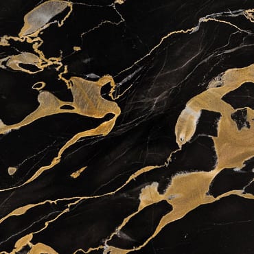 Porttoro marble slab face, photographed for the factory catalog — near-black brown overall.
